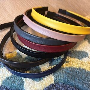 Stack of faux leather headbands
